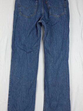 The lady's tight blue jeans